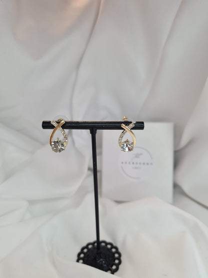 Laura Diamond cross earrings ( gold or silver)