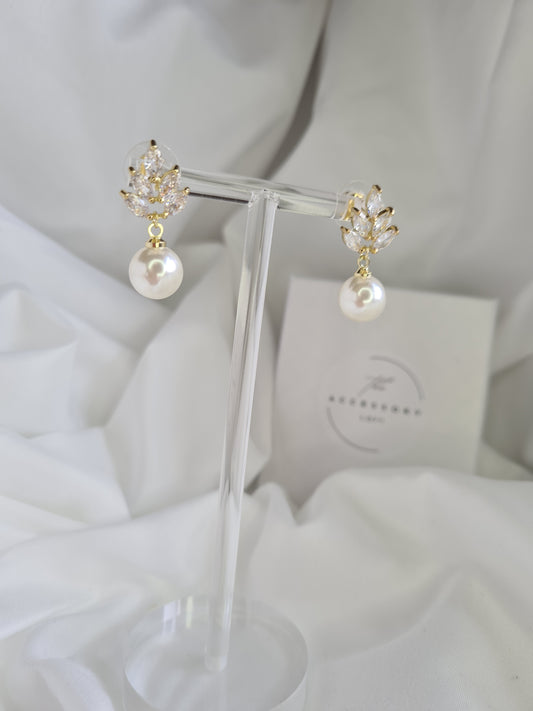 Lisa gold, diamond and pearl earrings.