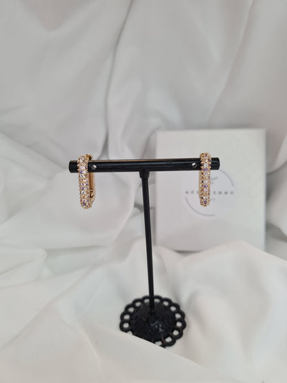 Una diamanté huggie hoop earrings