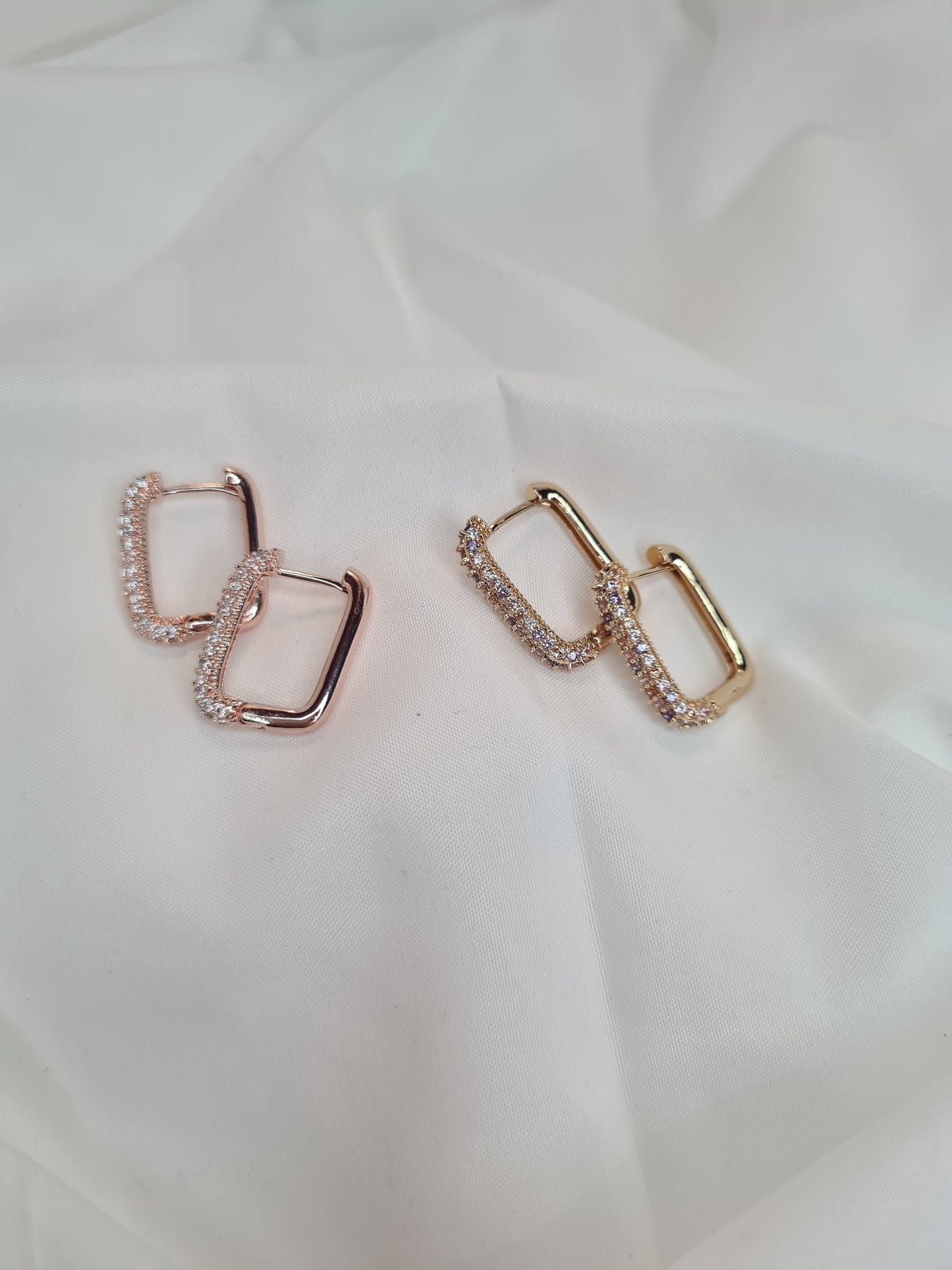 Una diamanté huggie hoop earrings