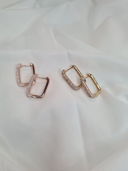 Una diamanté huggie hoop earrings