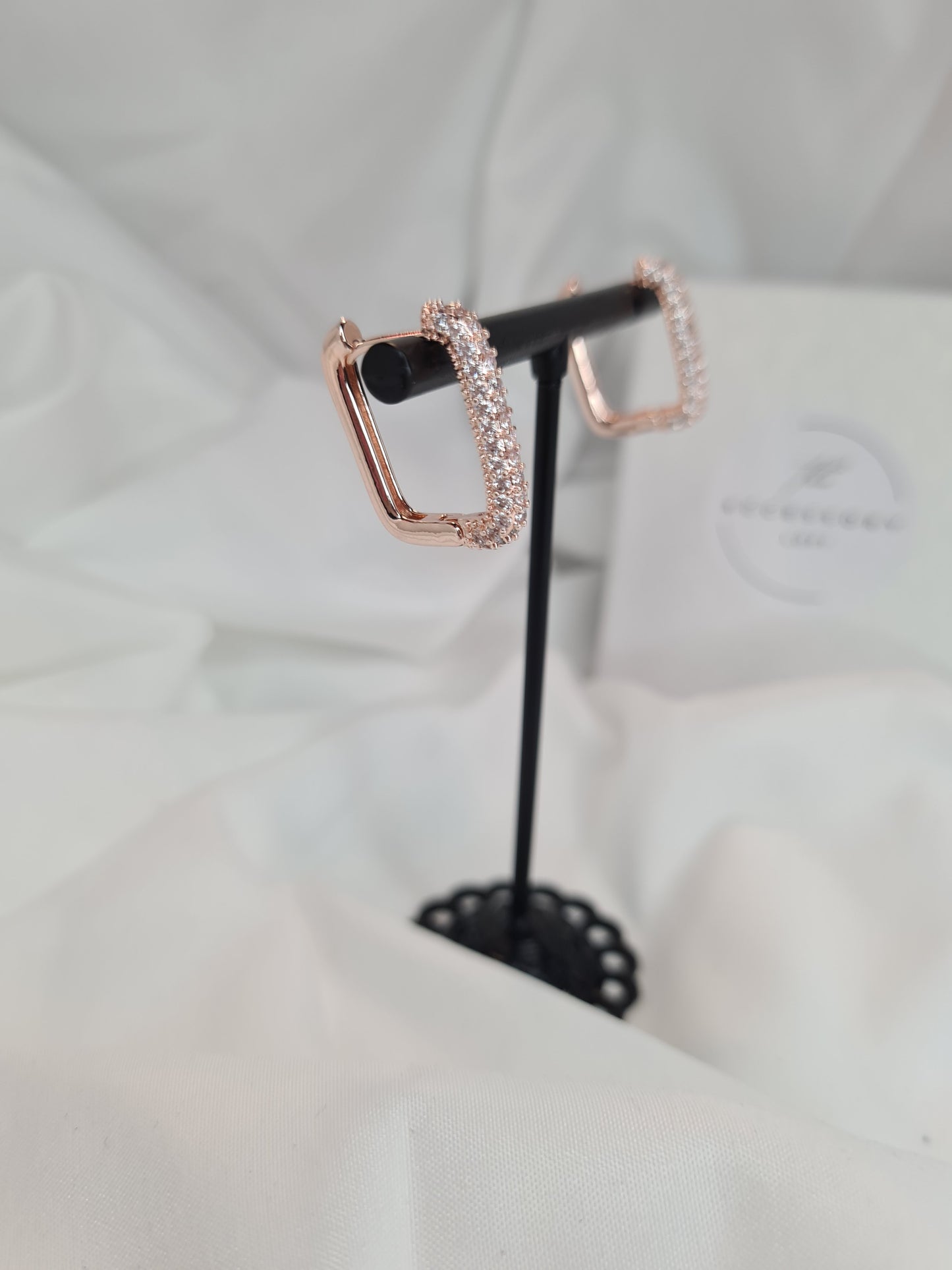 Una diamanté huggie hoop earrings